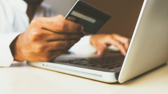 Stock photo of the Business Man with a credit card by rupixen